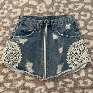 Carmar denim zip front skirt with lace detailing